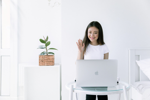Image of woman waving